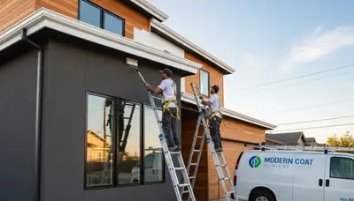 Professional trim and fascia painting on Andover MA home exterior by expert painters